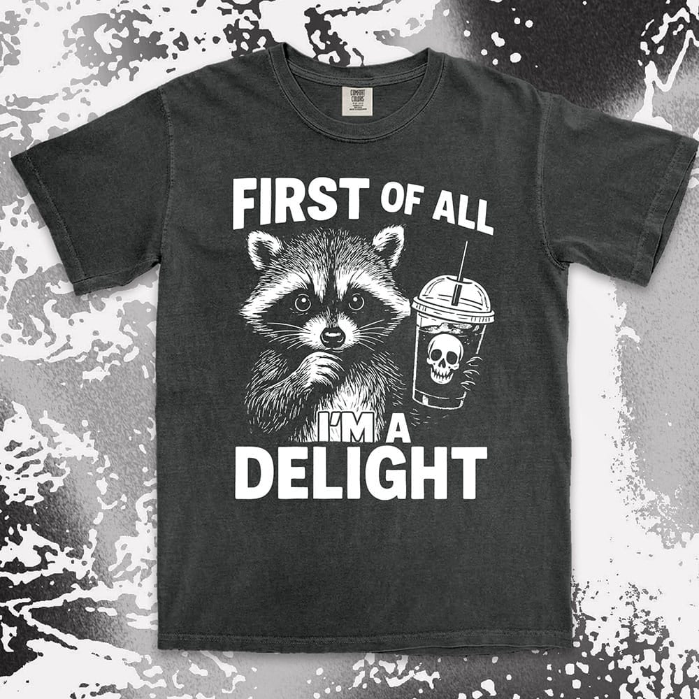 first of all iÕm a delight raccoon holding skull drink comfort colors t-shirt
