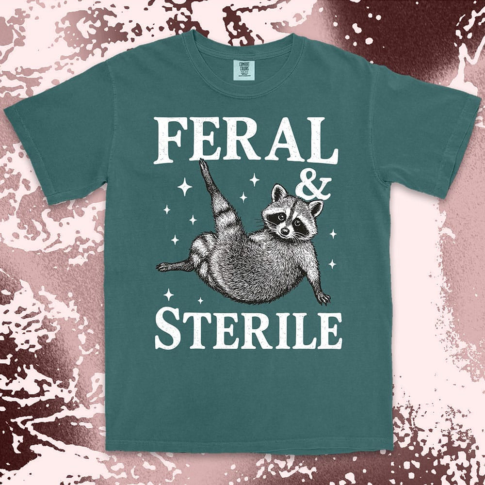 feral and sterile raccoon lying on back comfort colors t-shirt