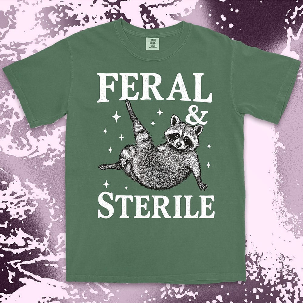 feral and sterile raccoon lying on back comfort colors t-shirt