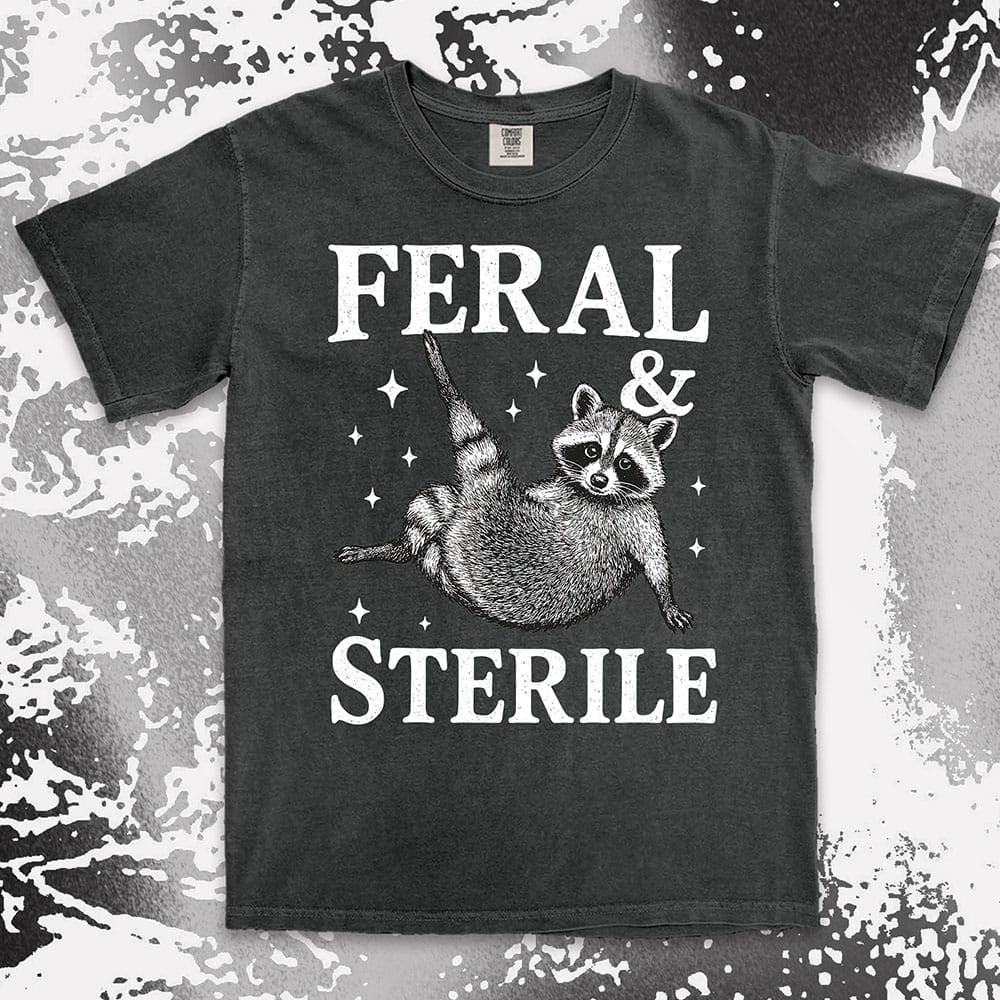 feral and sterile raccoon lying on back comfort colors t-shirt