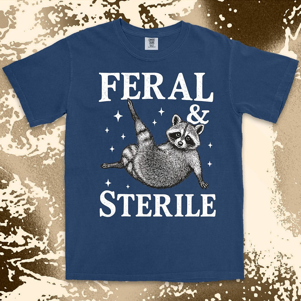 feral and sterile raccoon lying on back comfort colors t-shirt