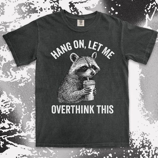 Funny raccoon shirt with “Hang On Let Me Overthink This” quote, anxious animal drinking cup design