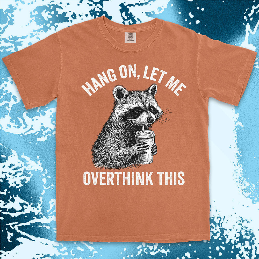 Funny raccoon shirt with “Hang On Let Me Overthink This” quote, anxious animal drinking cup design