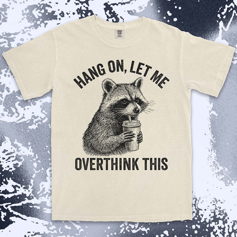 Funny raccoon shirt with “Hang On Let Me Overthink This” quote, anxious animal drinking cup design