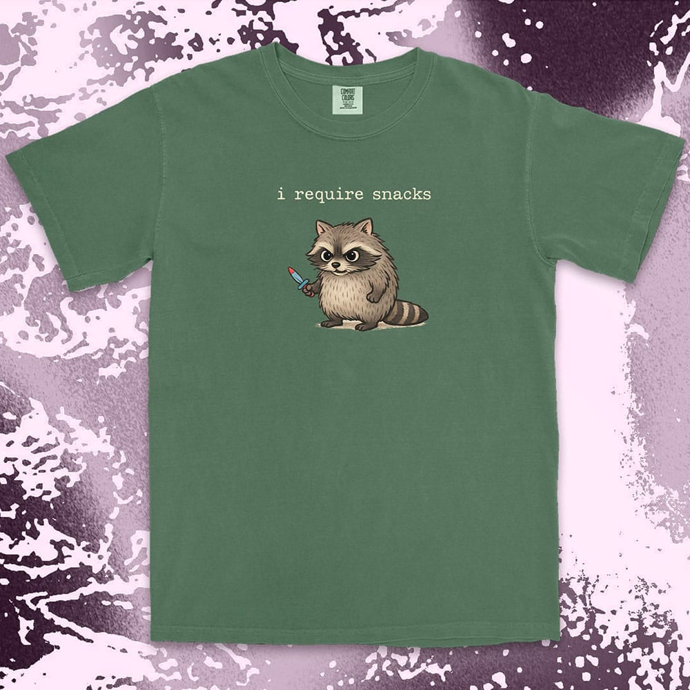 Cute raccoon shirt with ÒI require snacksÓ quote, chubby raccoon holding a small knife. Comfort Color t-shirt.