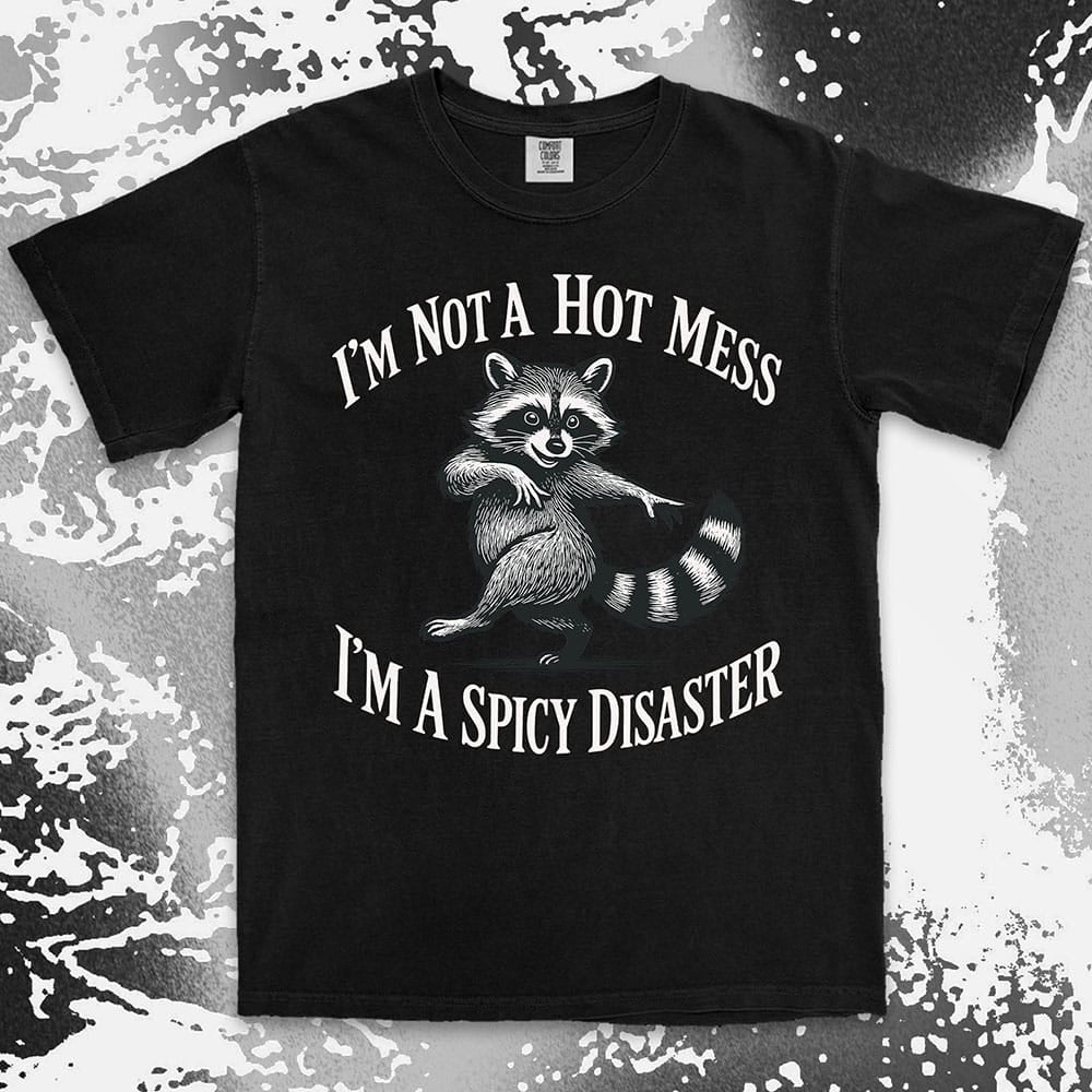 Funny raccoon shirt with dancing raccoon and quote ÒIÕm not a hot mess IÕm a spicy disasterÓ printed on Comfort Color t-shirt.