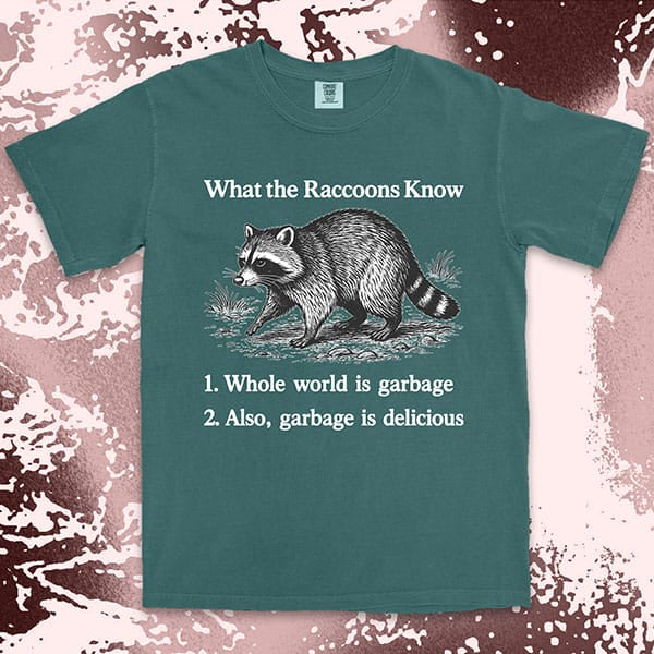 funny raccoon comfort colors t-shirt with quote what the raccoons know whole world is garbage also garbage is delicious meme tee
