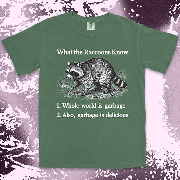funny raccoon comfort colors t-shirt with quote what the raccoons know whole world is garbage also garbage is delicious meme tee