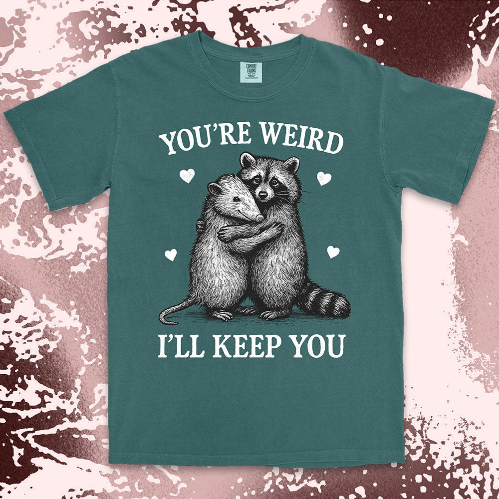 Funny raccoon possum hugging graphic with text You’re Weird I’ll Keep You comfort color t shirt