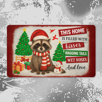 Christmas raccoon doormat with Santa hat, Christmas trees, and quote “This home is filled with kisses, wagging tails, wet noses, and love.”