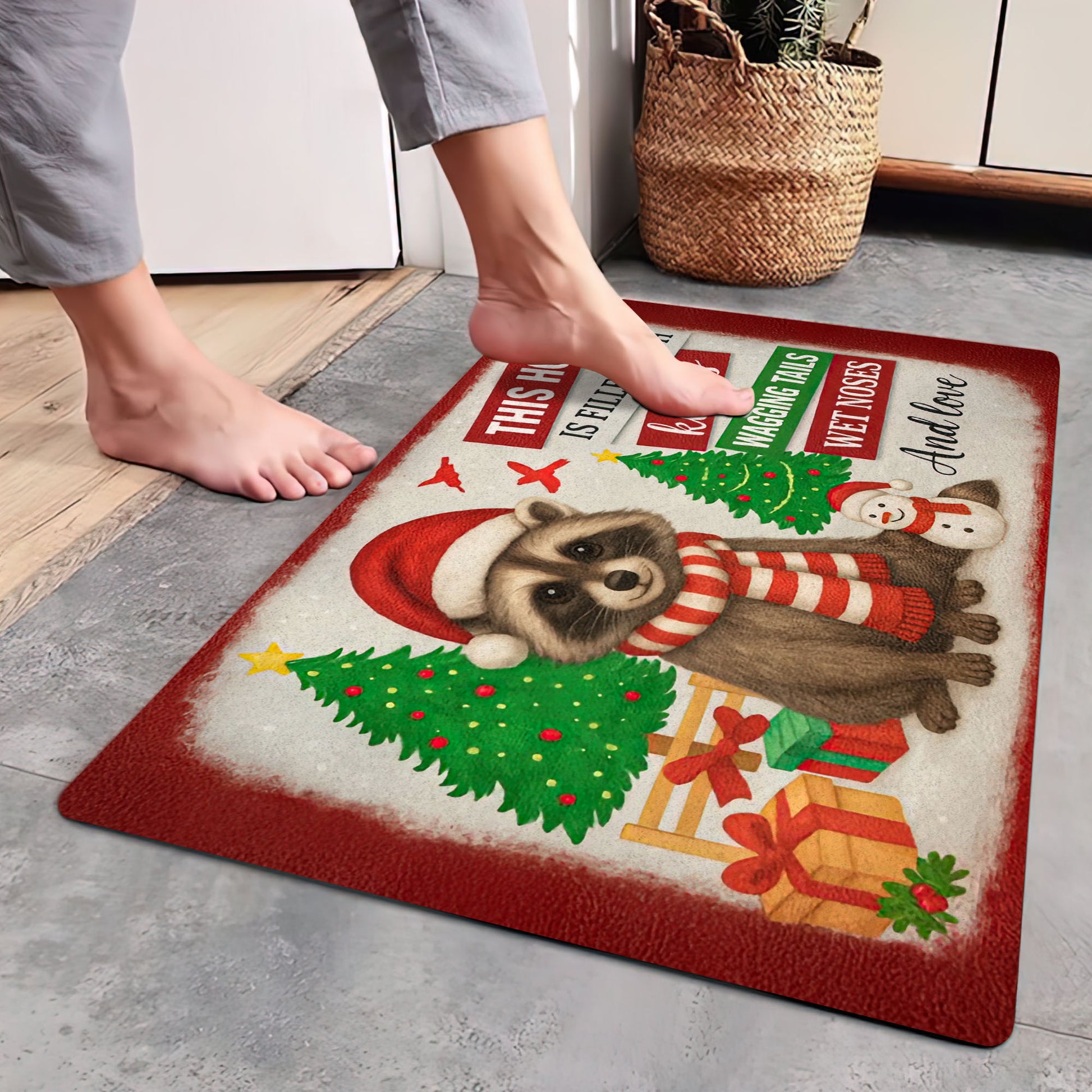 Christmas raccoon doormat with Santa hat, Christmas trees, and quote “This home is filled with kisses, wagging tails, wet noses, and love.”