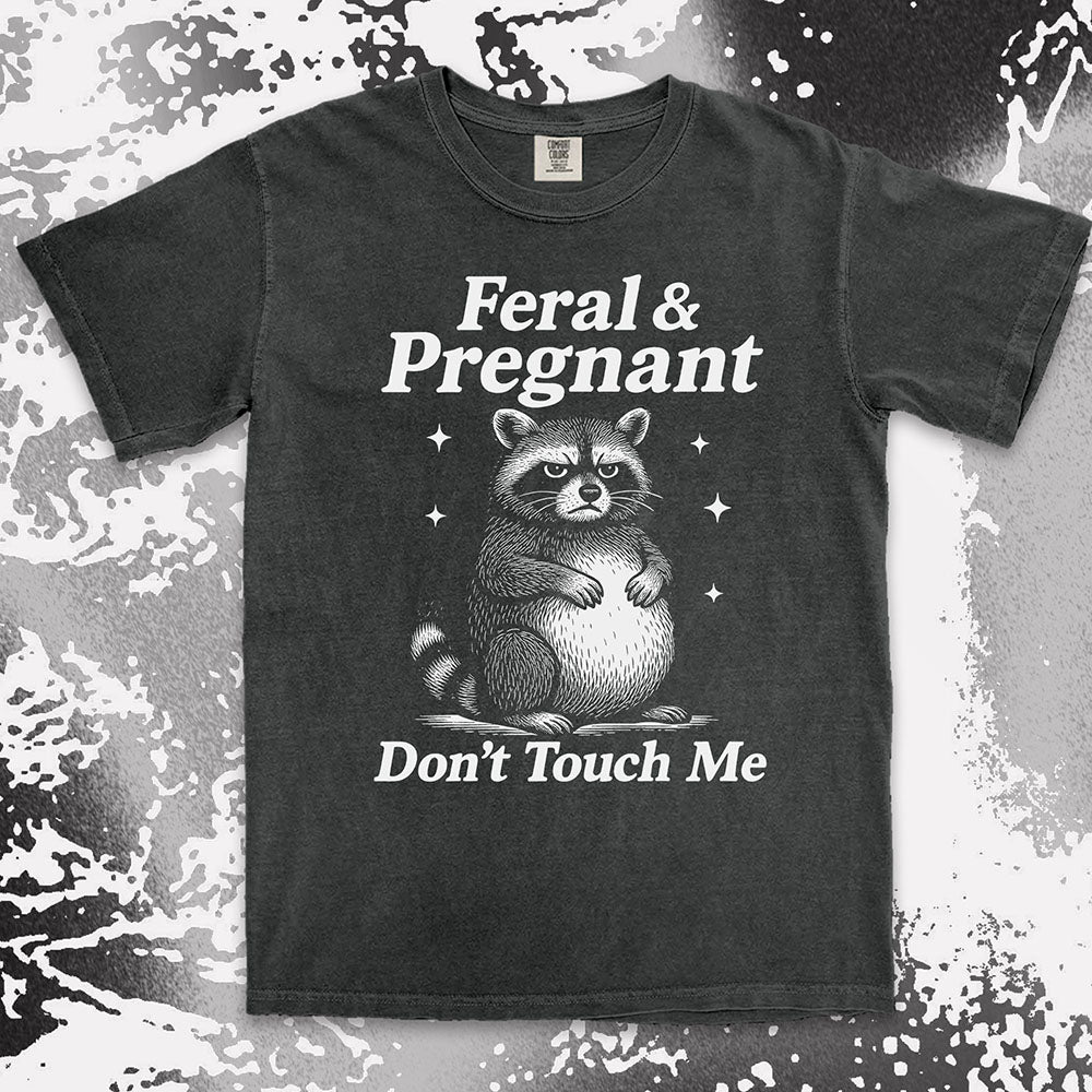 Funny raccoon shirt with “Feral & Pregnant Don’t Touch Me” quote, bold humor maternity design