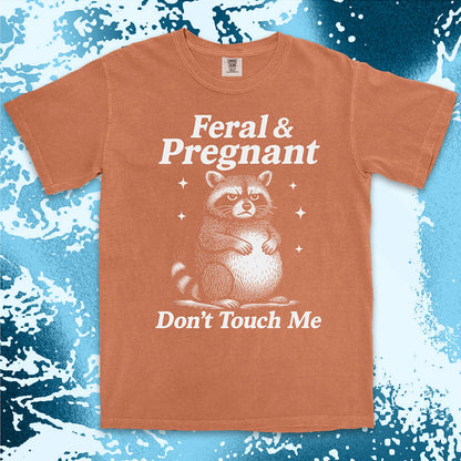 Funny raccoon shirt with “Feral & Pregnant Don’t Touch Me” quote, bold humor maternity design