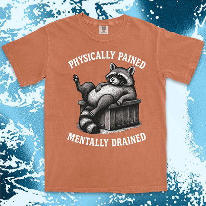 Sarcastic raccoon graphic with text Physically Pained Mentally Drained comfort color t shirt