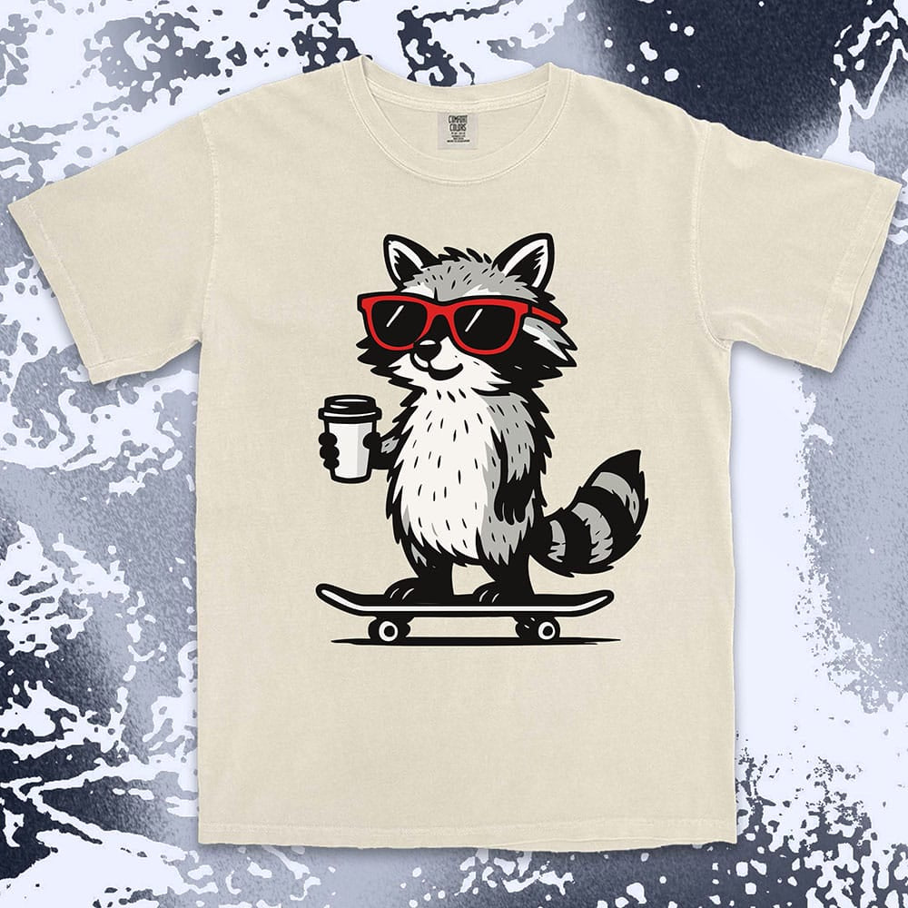 Raccoon with skateboard and coffee, wearing red sunglasses, cool skater raccoon design on Comfort Color t-shirt.