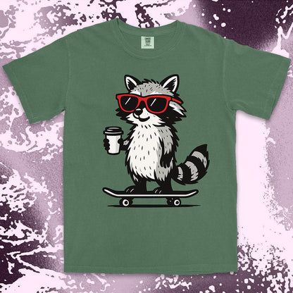 Raccoon with skateboard and coffee, wearing red sunglasses, cool skater raccoon design on Comfort Color t-shirt.