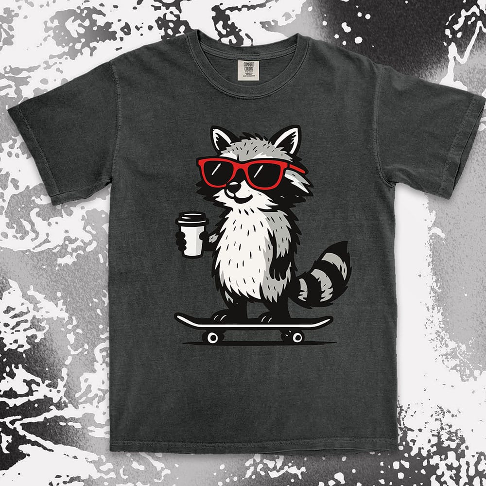 Raccoon with skateboard and coffee, wearing red sunglasses, cool skater raccoon design on Comfort Color t-shirt.