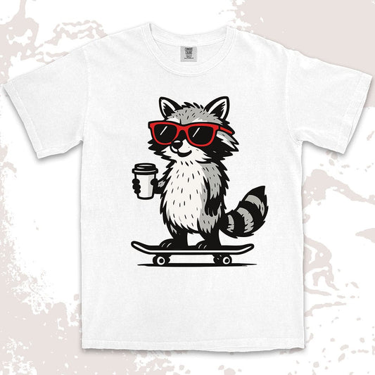 Raccoon with skateboard and coffee, wearing red sunglasses, cool skater raccoon design on Comfort Color t-shirt.
