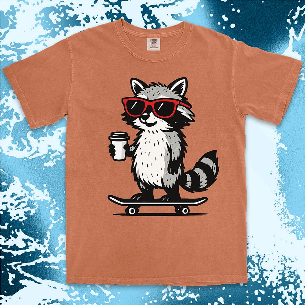 Raccoon with skateboard and coffee, wearing red sunglasses, cool skater raccoon design on Comfort Color t-shirt.