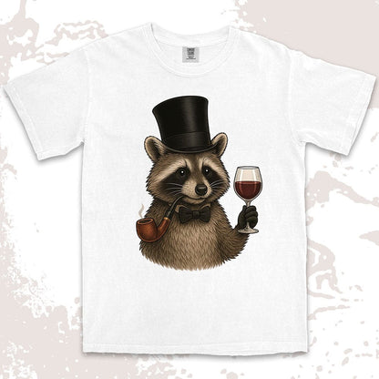 Raccoon shirt featuring a gentleman raccoon in top hat and bow tie, holding a glass of wine and smoking a pipe, on Comfort Color t-shirt.