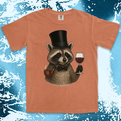 Raccoon shirt featuring a gentleman raccoon in top hat and bow tie, holding a glass of wine and smoking a pipe, on Comfort Color t-shirt.