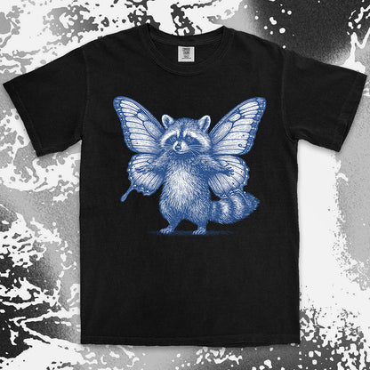 Comfort Color t-shirt with raccoon illustration featuring big butterfly wings in a magical fairy style.