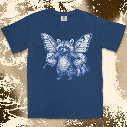 Comfort Color t-shirt with raccoon illustration featuring big butterfly wings in a magical fairy style.
