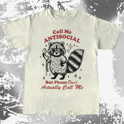 Antisocial raccoon t-shirt design with quote “Call Me Antisocial But Please Don’t Actually Call Me”
