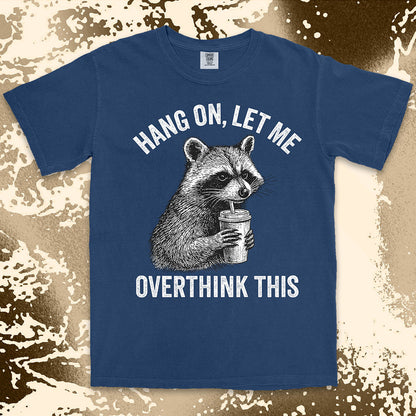 Funny raccoon shirt with “Hang On Let Me Overthink This” quote, anxious animal drinking cup design