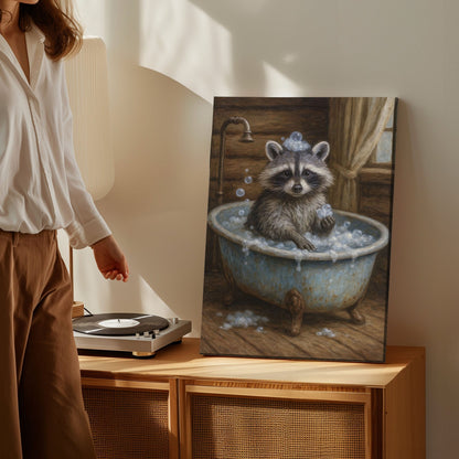 Whimsical raccoon bath canvas wall art featuring a raccoon in a vintage tub with bubbles inside a rustic wooden cabin