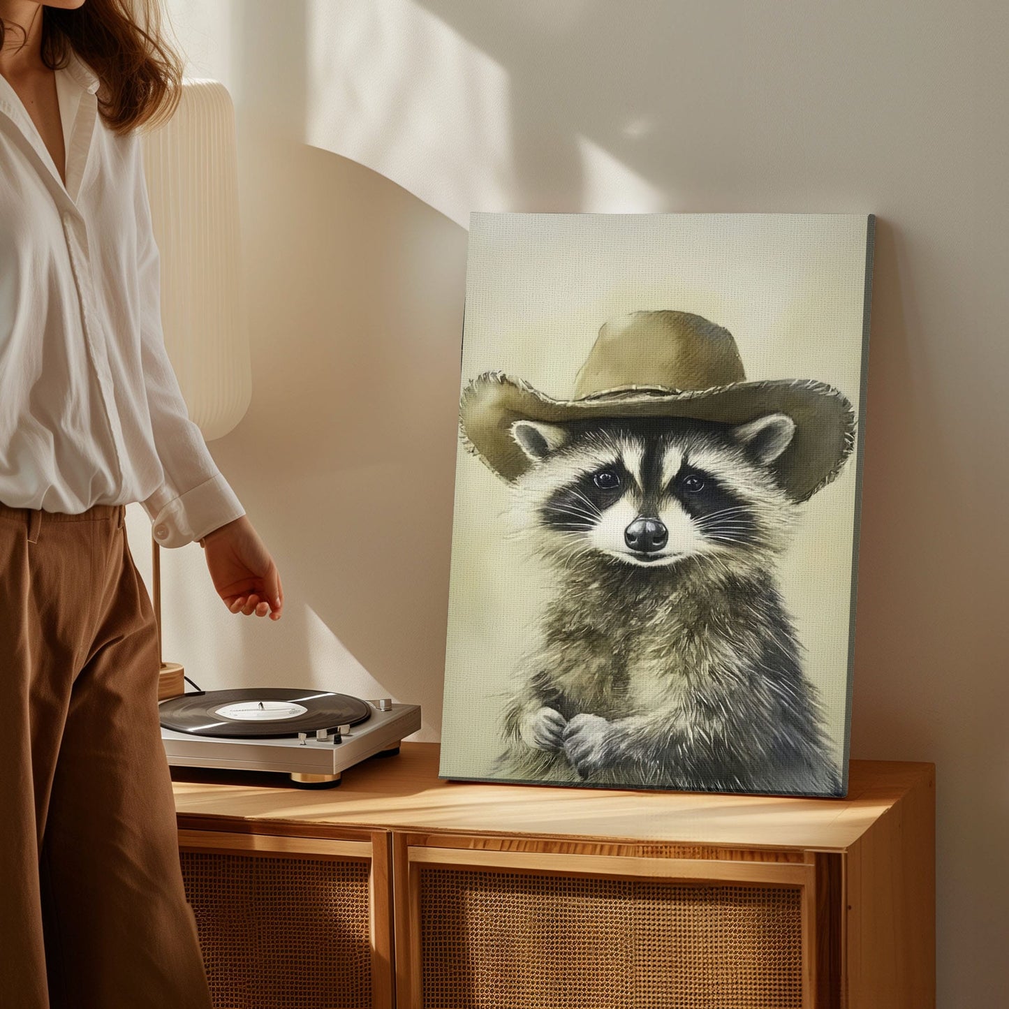 Cowboy raccoon canvas wall art featuring a raccoon wearing a vintage brown cowboy hat in rustic western style