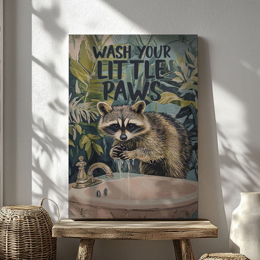 Wash Your Little Paws raccoon canvas wall art featuring a raccoon washing hands at sink with green tropical leaves background