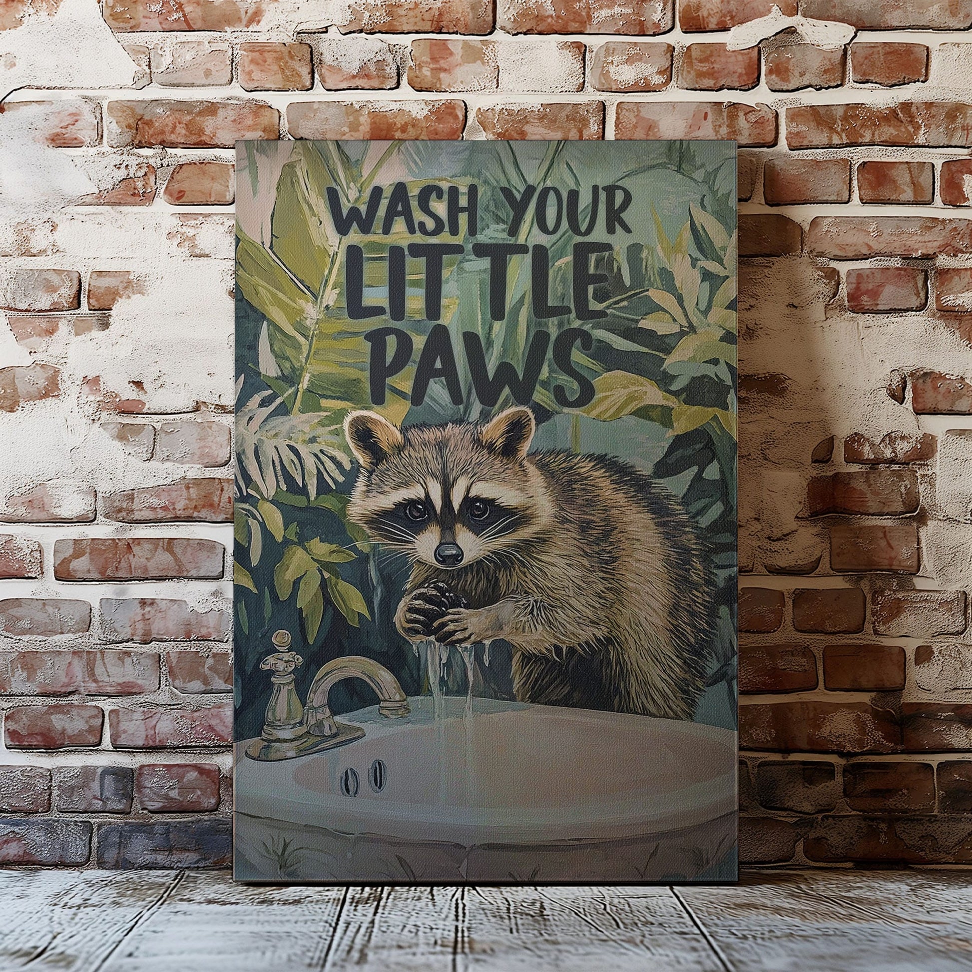 Wash Your Little Paws raccoon canvas wall art featuring a raccoon washing hands at sink with green tropical leaves background
