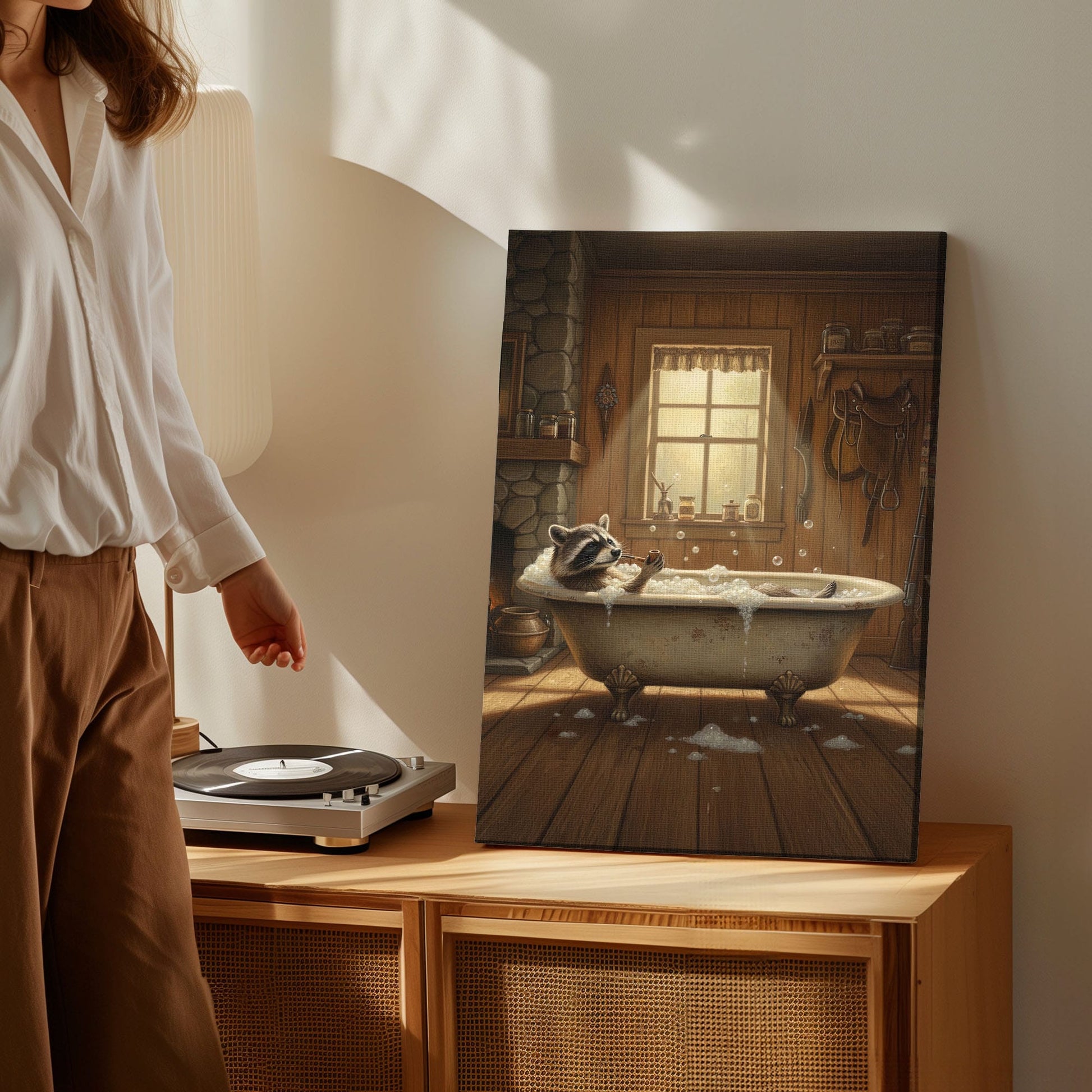 Cozy bathtub raccoon canvas wall art featuring a raccoon relaxing in a vintage clawfoot tub inside rustic wooden cabin with warm lighting