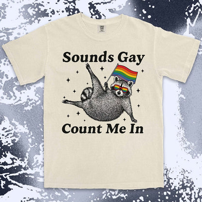 raccoon pride comfort colors t-shirt sounds gay count me in with rainbow flag and sunglasses