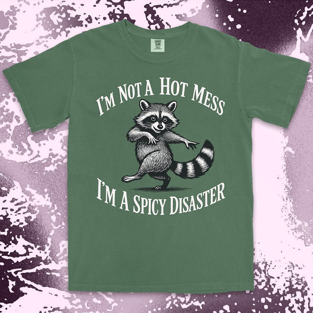 Funny raccoon shirt with dancing raccoon and quote ÒIÕm not a hot mess IÕm a spicy disasterÓ printed on Comfort Color t-shirt.