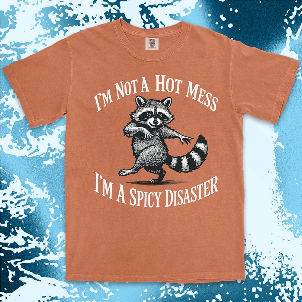 Funny raccoon shirt with dancing raccoon and quote ÒIÕm not a hot mess IÕm a spicy disasterÓ printed on Comfort Color t-shirt.
