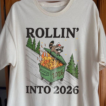 Rollin’ Into 2026 Raccoon Dumpster Fire Christmas Shirt
