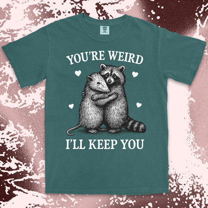 Funny raccoon possum hugging graphic with text You’re Weird I’ll Keep You comfort color t shirt
