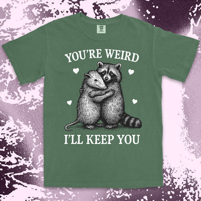 Funny raccoon possum hugging graphic with text You’re Weird I’ll Keep You comfort color t shirt