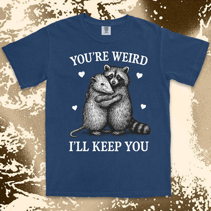 Funny raccoon possum hugging graphic with text You’re Weird I’ll Keep You comfort color t shirt